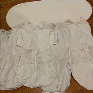 3 Small & 1 medium snoo sacks and 1 snoo bed insert